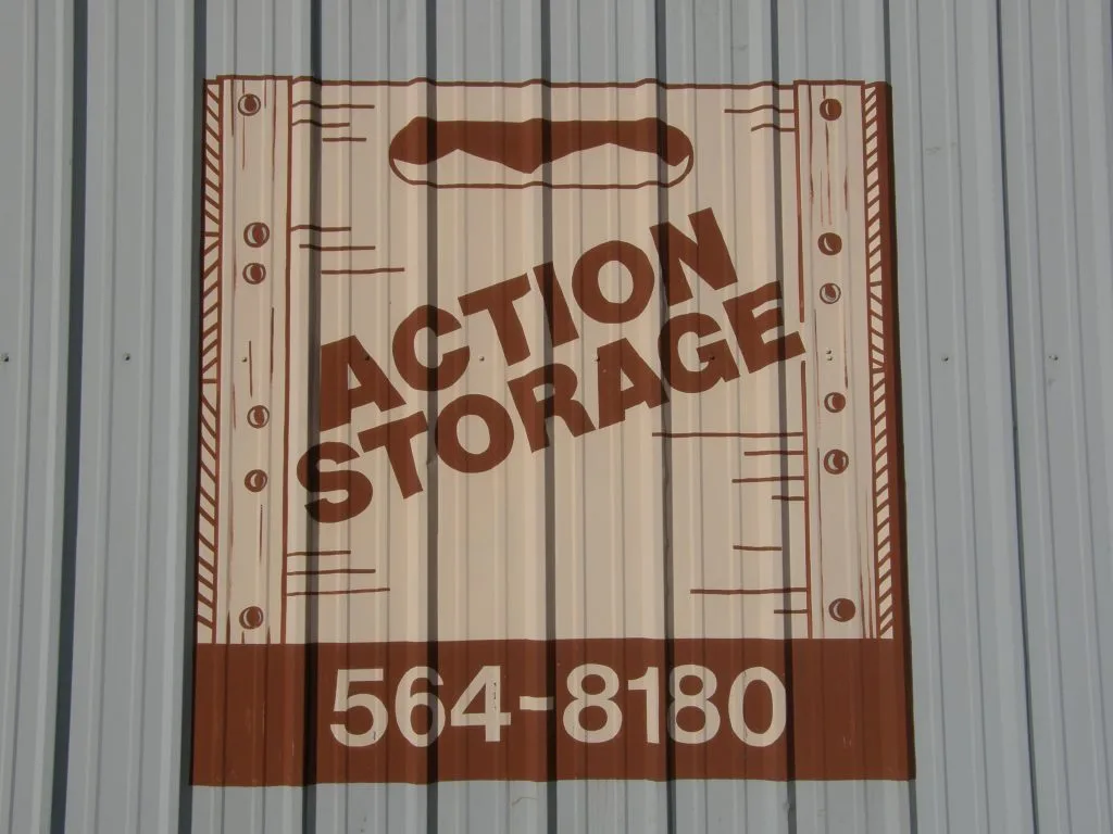 Action Storage wall sign on the storage facility exterior in Nacogdoches